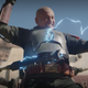 The unmasked Boba Fett is electrocuted by two masked assailants in Mos Espa.